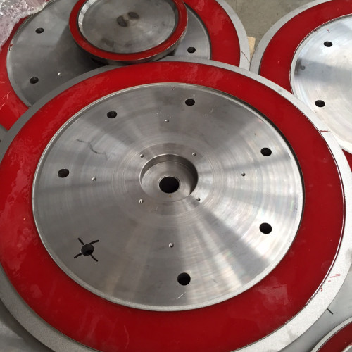 Guarnizione in poliuretano colata direttamente nella cava del disco in acciaio fornito dal cliente